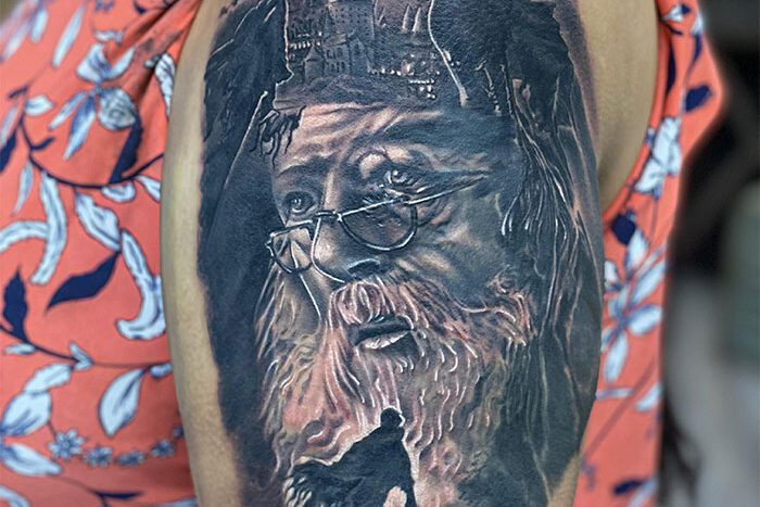 Black and grey tattoo by Mike Thompson-Hill