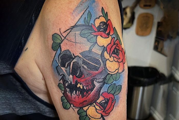 Colorful skull tattoo by Hollywood
