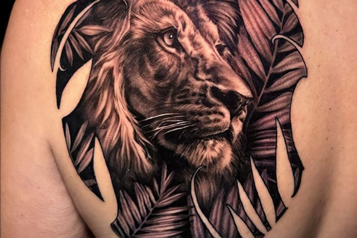 Lion portrait tattoo by Scott Hart