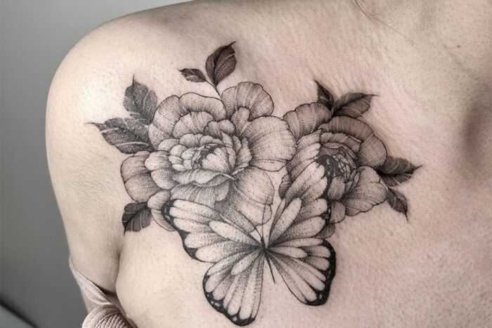 Tattoo of butterfly and flowers