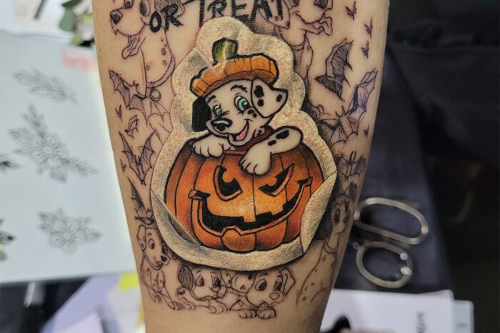 Tattoo of dalmatian puppy in pumkin