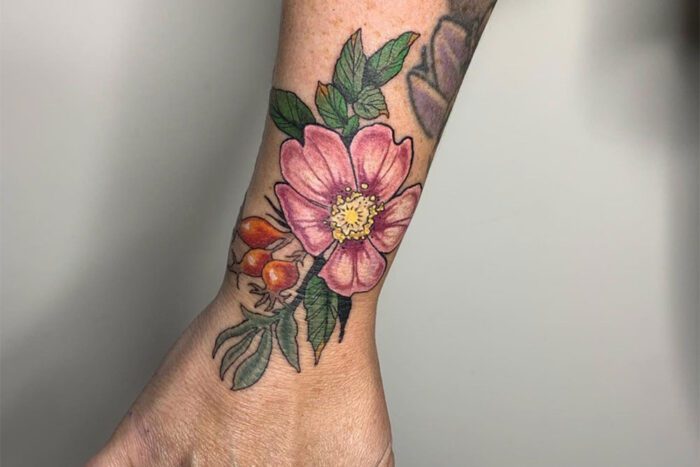 Flowers on wrist tattoo