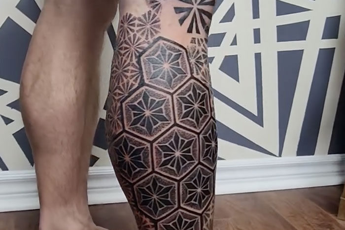 Leg tattoo by Ian Miller