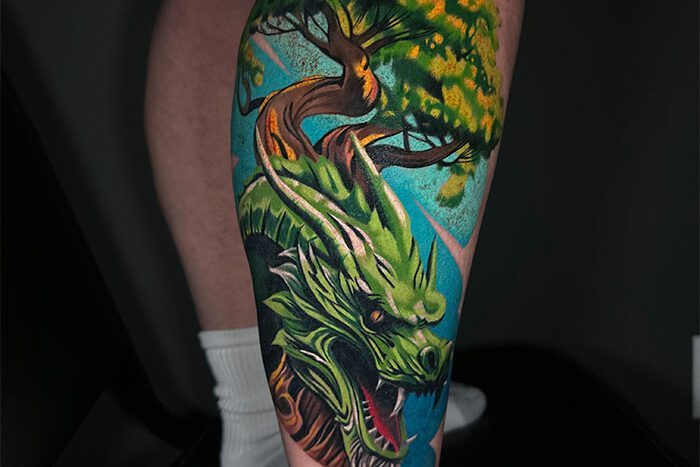 Dinosaur tattoo by Artem Nebesnyi