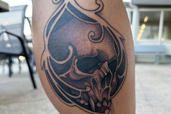 Grey skull tattoo