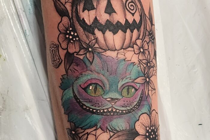 Tattoo of kitty and jack o lantern