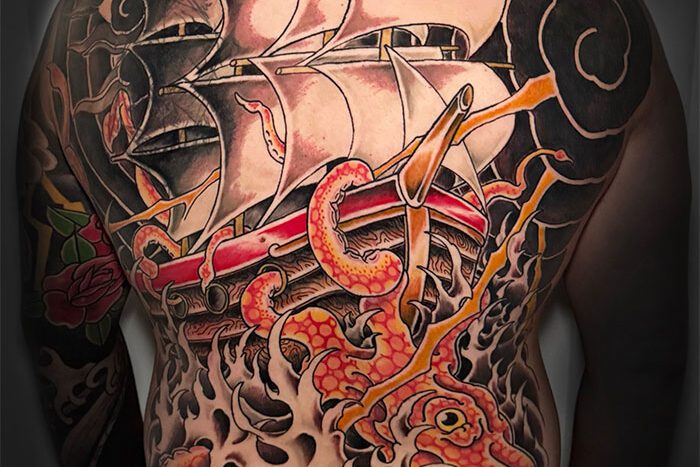 Squid attacking ship tattoo, by Mike Fidelak
