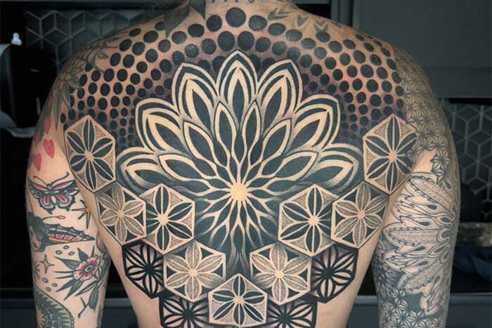 Geometric back piece tattoo by Crystal Alexandria