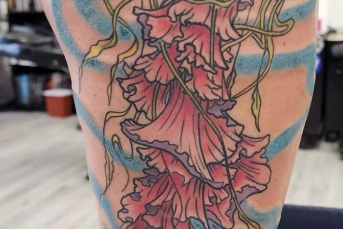 Squid tattoo on leg