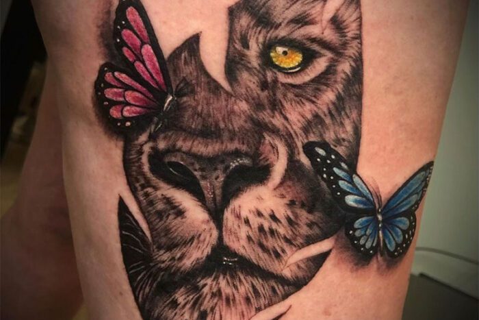 Tattoo of Lion and butterflies