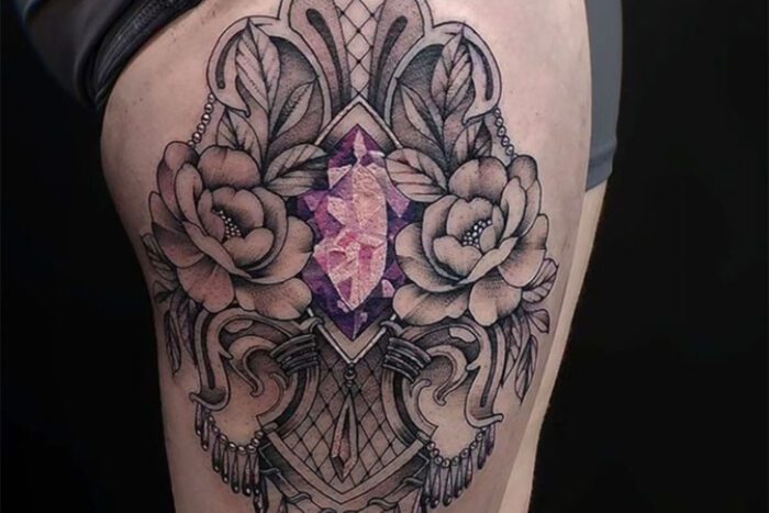 Tattoo with jewel in middle