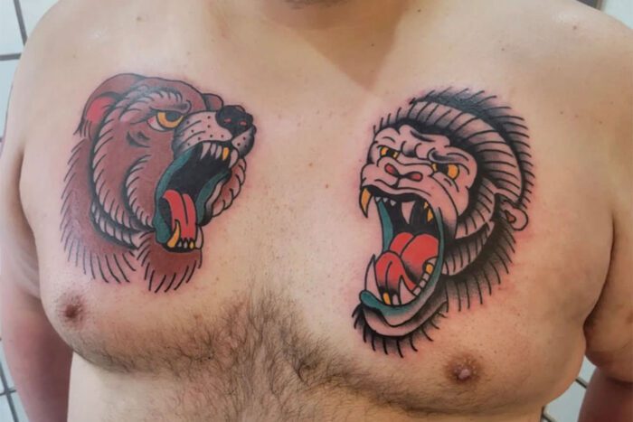 Bear and ape chest tattoos
