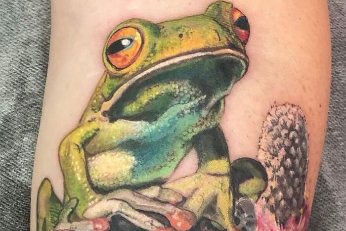 Frog tattoo by Nadine Mitchell