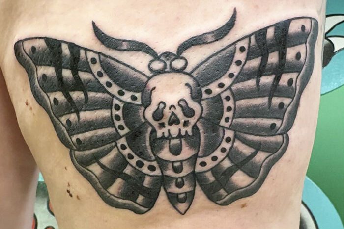 Moth tattoo by Riley Farrell