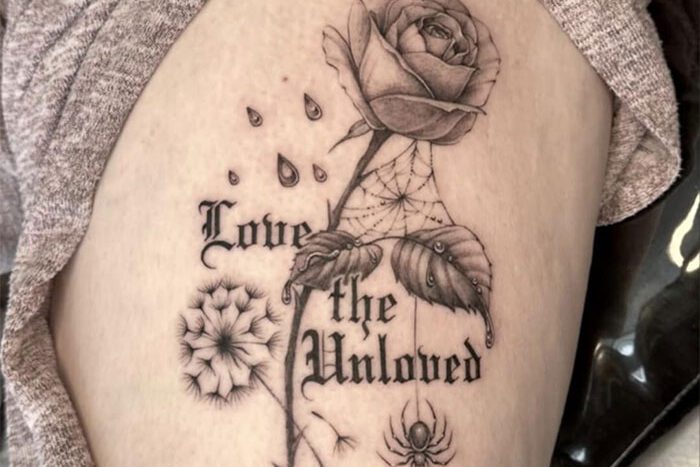 Rose with Love the Unloved, tattoo by Taylor Facca