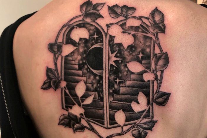 Tattoo of windows and flowers