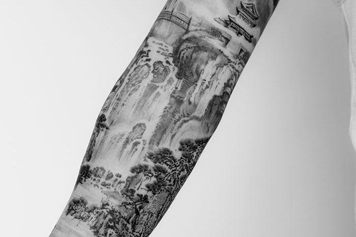 Black and grey tattoo by Felix Chen