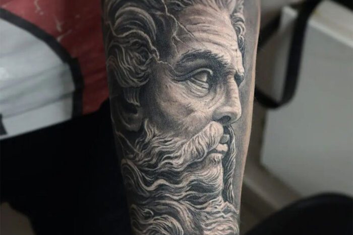 Greek god portrait tattoo