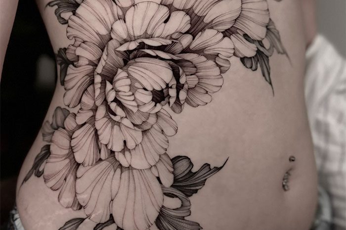 Flower tattoos by Brandi Gollan