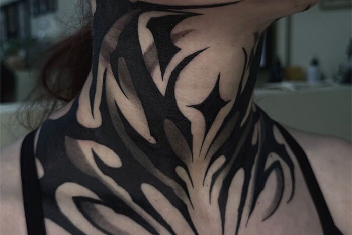 Neck tattoo by Seph Melanson