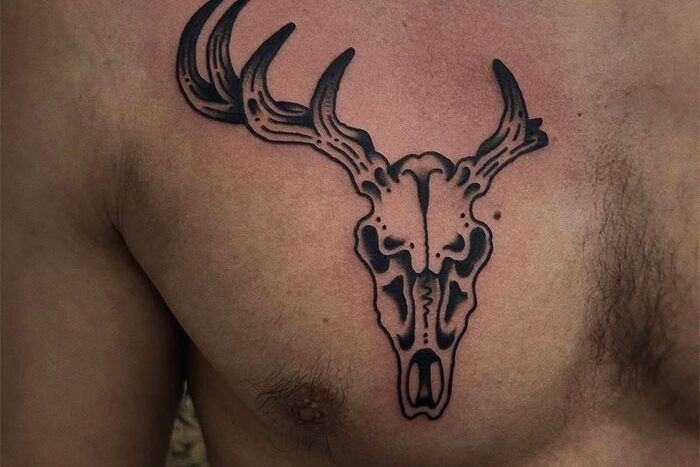 Animal skull tattoo by Jeff Boschmann