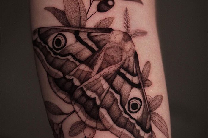 Moth tattoo by Sidney Gulka