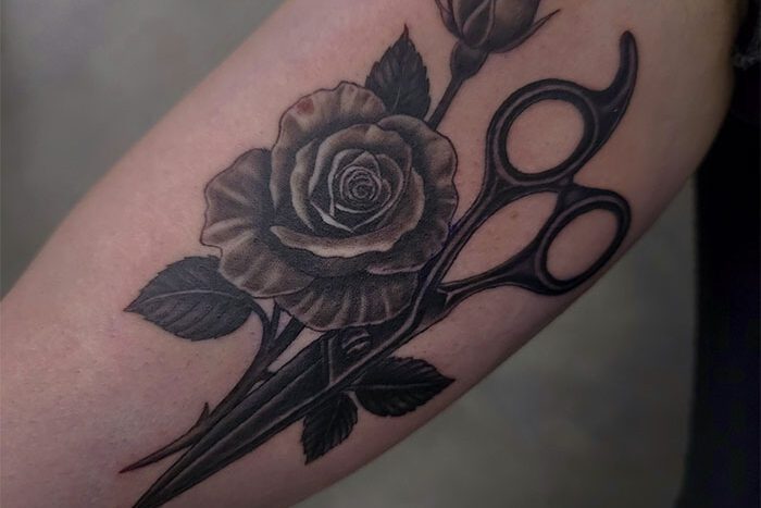 Scissors and rose tattoo by Jericho Adobas