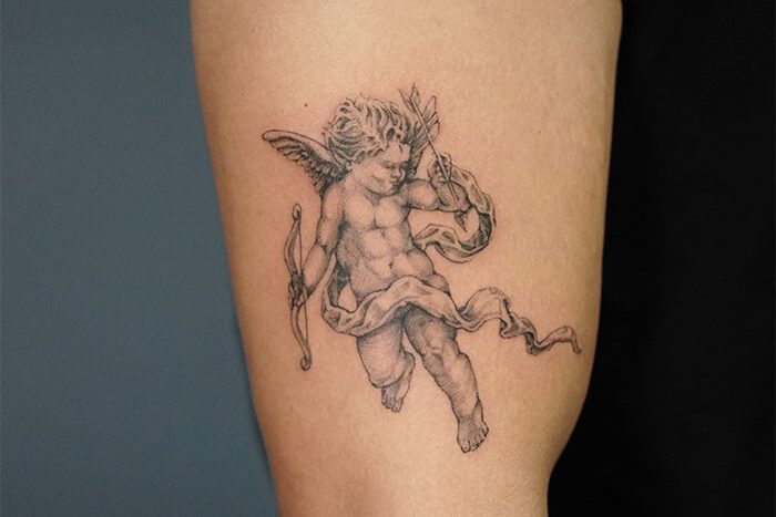 Cupid tattoo by Dyann Navarro