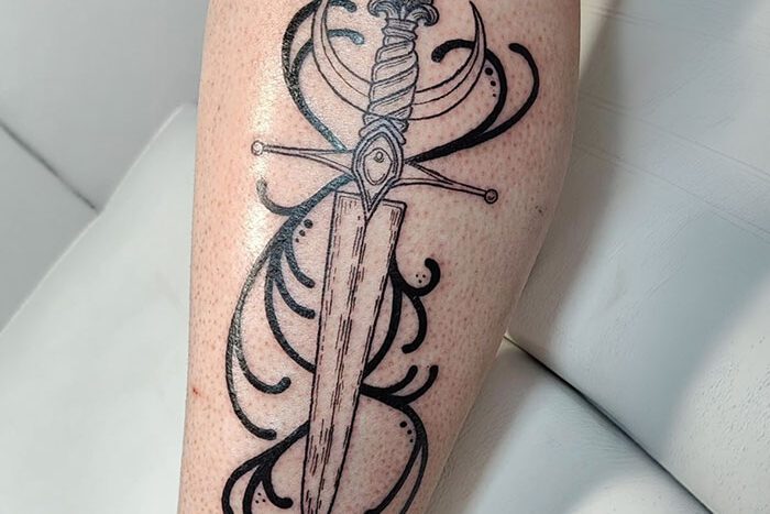 Dagger tattoo by Cain