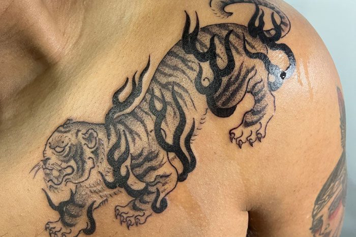 Traditional tiger tattoo, by Janel Chau