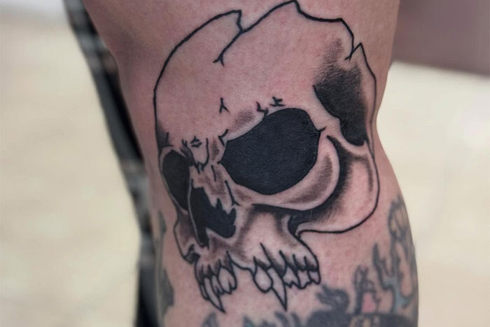 Skull tattoo by Tim Clarke